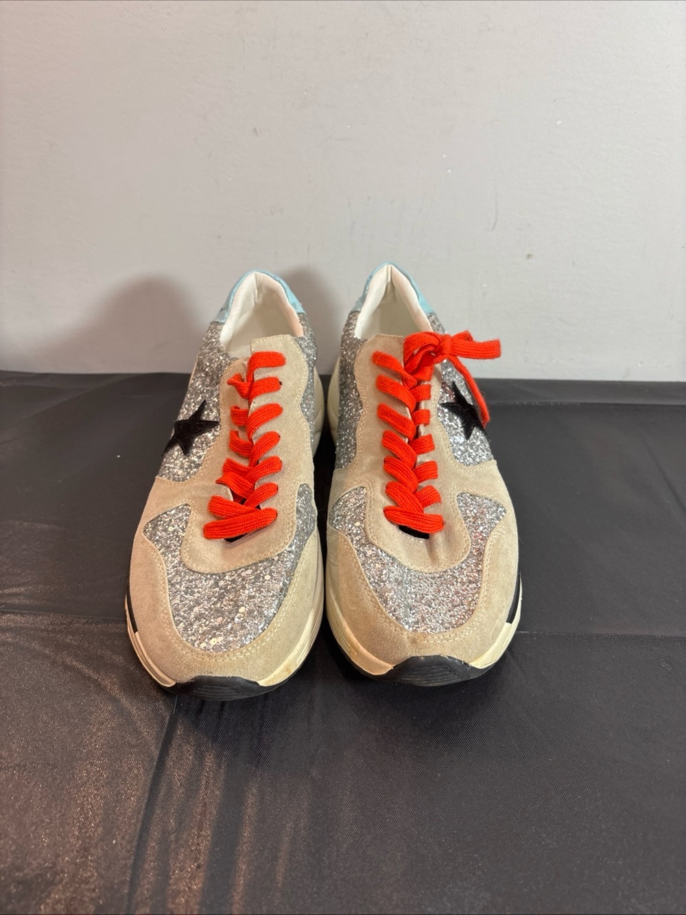 White Haven Women’s Glitter Sneakers with orange Laces. 9/13